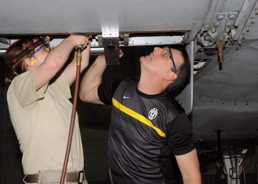 BARKSDALE AIR FORCE BASE, La. -- Airman 1st Class Jazzlyn Guidry and Tech. Sgt. David Griffore, an Active Reserve Technician for the 717th Aircraft Maintenance Squadron, perform a slat repair on an A-10 Thunderbolt March 18. ARTs are full-time Federal civil-service employees serving in a position that requires an active reserve assignment in a reserve unit. ARTs are ready reservists assigned to and training with the unit in which they are employed and must occupy an equivalent reserve military position with a comparable military rank or grade. (U.S. Air Force photo by Staff Sgt. John Gordinier)