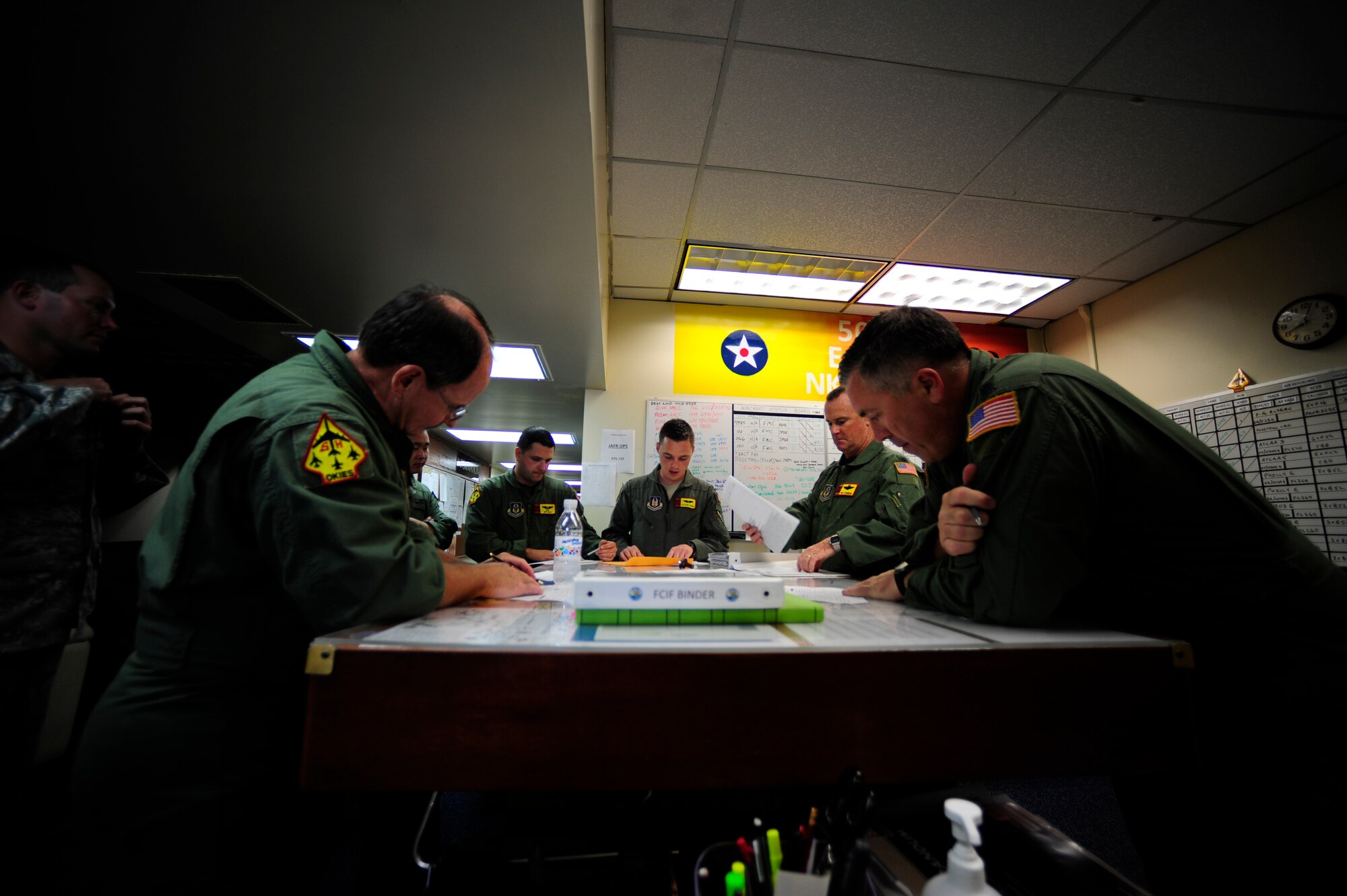 A U.S. Air Force KC-135 Stratotanker crew from the 465 Air Refueling Squadron, Tinker Air Force Base, Okla., conducts a brief before an aerial refueling mission at Andersen AFB, Guam, Feb. 17, 2010. (U.S. Air Force photo by Staff Sgt. Andy M. Kin / Released)