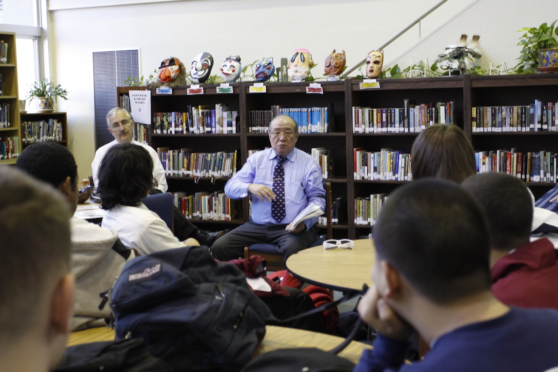 Masayuki Matsumuro, former Kamikaze pilot and World War II survivor, speaks with students in the library at Matthew C. Perry High School here March 19. Despite a tragic past, Matsumuro spoke about the hope of an optimistic future and alliance between Japanese and American forces.