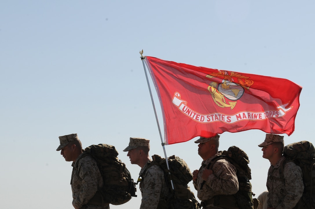 Yuma-based Marines Gunnery Sgt. Fred Suniga, Lance Cpl. Shane Fields, Pfc. Adrian Velasquez and Lance Cpl. Anthony Scott march along the course of the 2010 Bataan Memorial Death March at White Sands Missile Range, N.M., March 21, 2010. The annual 26.2-mile march is held in memory of the nearly 75,000 American and Filipino service members forced to march across 90 miles of the Philippine Bataan peninsula with limited rations and harsh heat after being captured by the Japanese in 1942. The Marines, along with a record-breaking number of 5,700 marchers, stepped off at 8 a.m. The Marines marched for over ten hours, endured debilitating weather, high altitudes and unforgiving terrain to commemorate Bataan survivors. At least nine Marines from the Marine Corps Air Station in Yuma, Ariz., participated in the event.