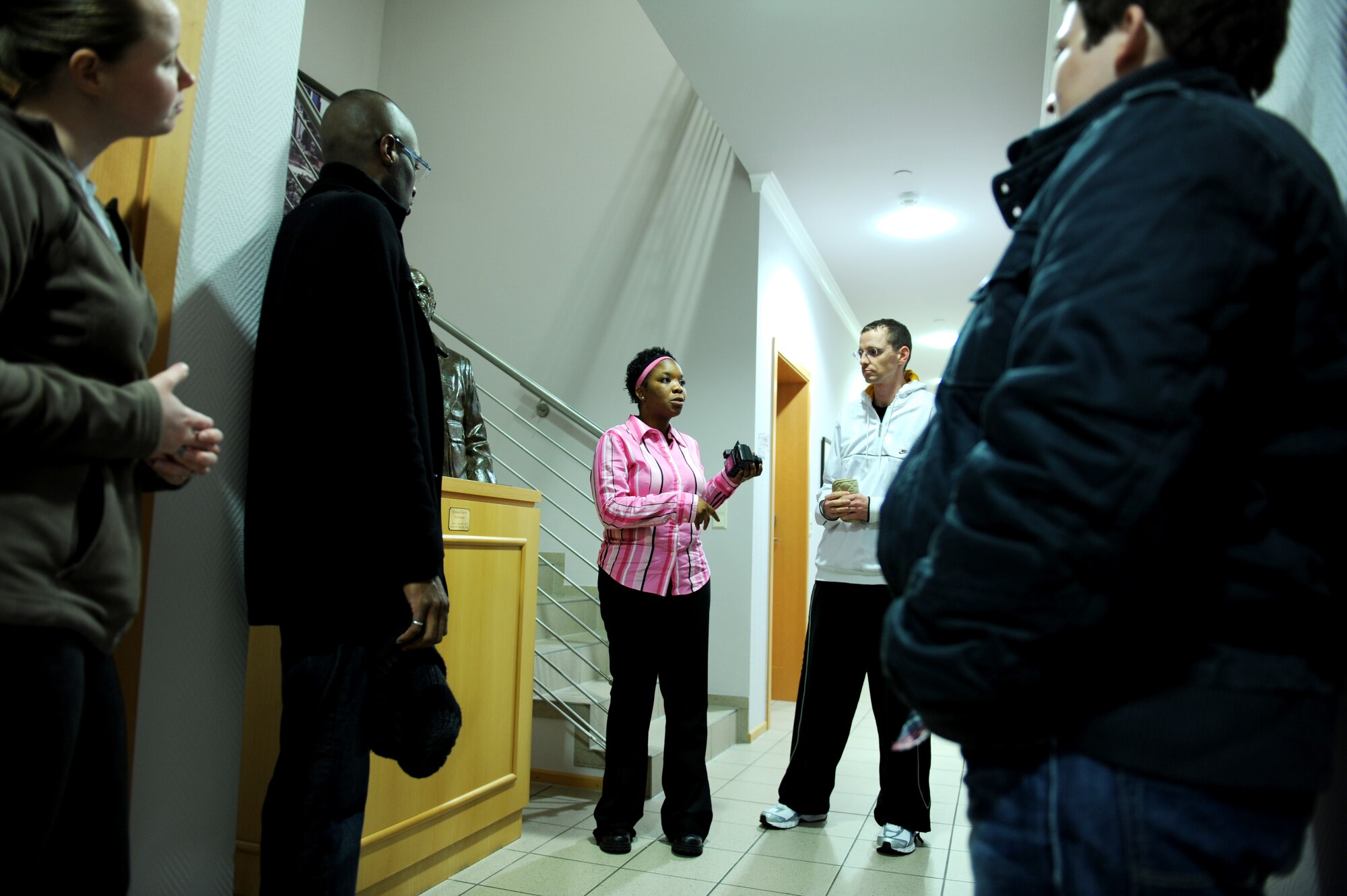 U.S. Air Force Staff Sgt. Angelica Kaylor,  5/6 vice president and Allied Air Component Command Headquarters team council Fisher House liaison, gives a brief on how the Fisher House operates, Landstuhl Regional Medical Center, Germany, March 20, 2010. (U.S. Air Force photo by Tech. Sgt. Sarayuth Pinthong)