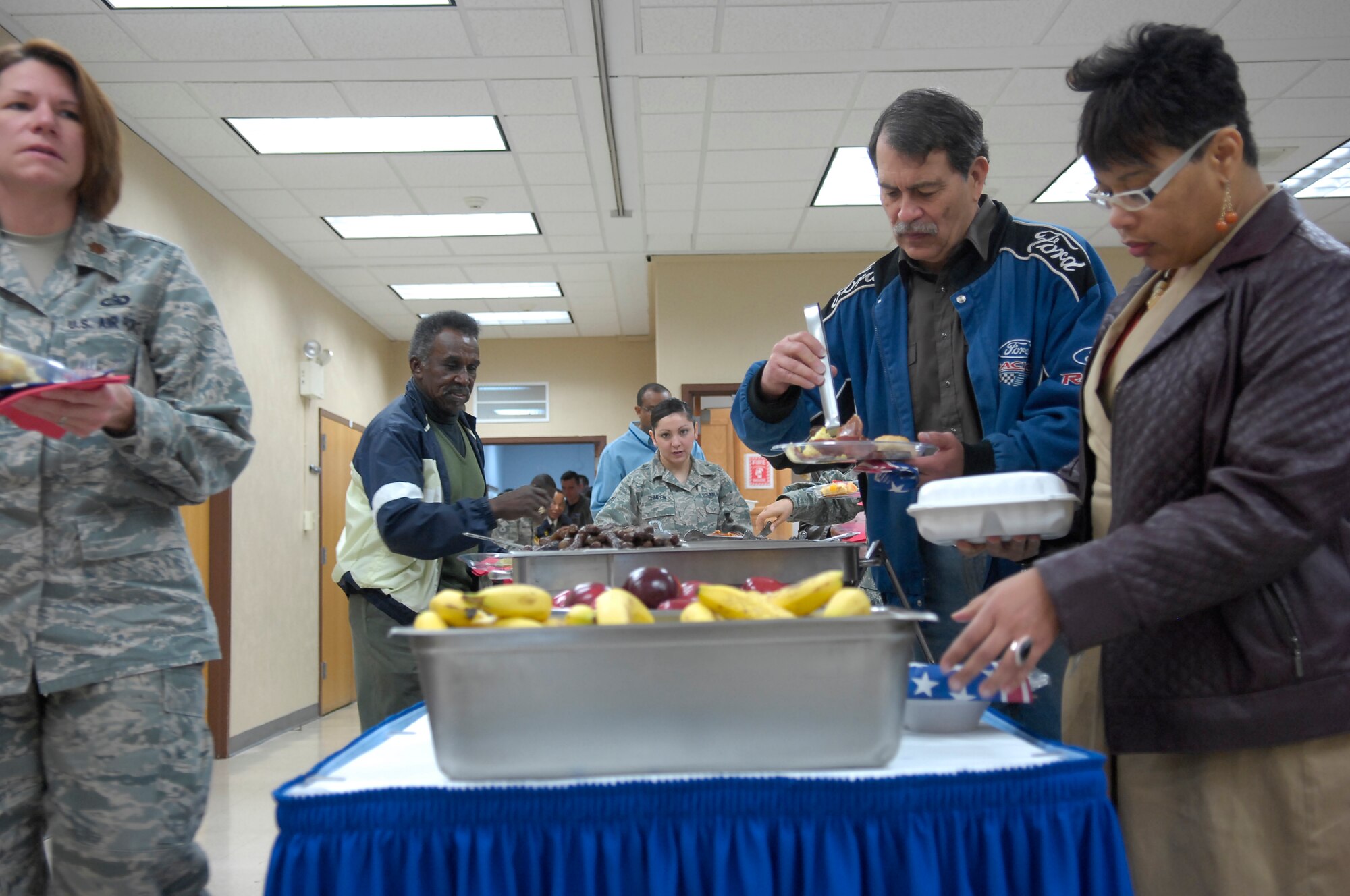 Pope Airmen gather in the early morning at the Pope Chapel to enjoy the National Prayer Breakfast March 19. Airmen listened to guest speaker, Chaplain (Col.) Conrado Navarro, Air Mobility Command Chaplain and musical guest, Pastor Marvin Gregory. (U.S. Air Force Photo by Senior Airman Kris Levasseur) 