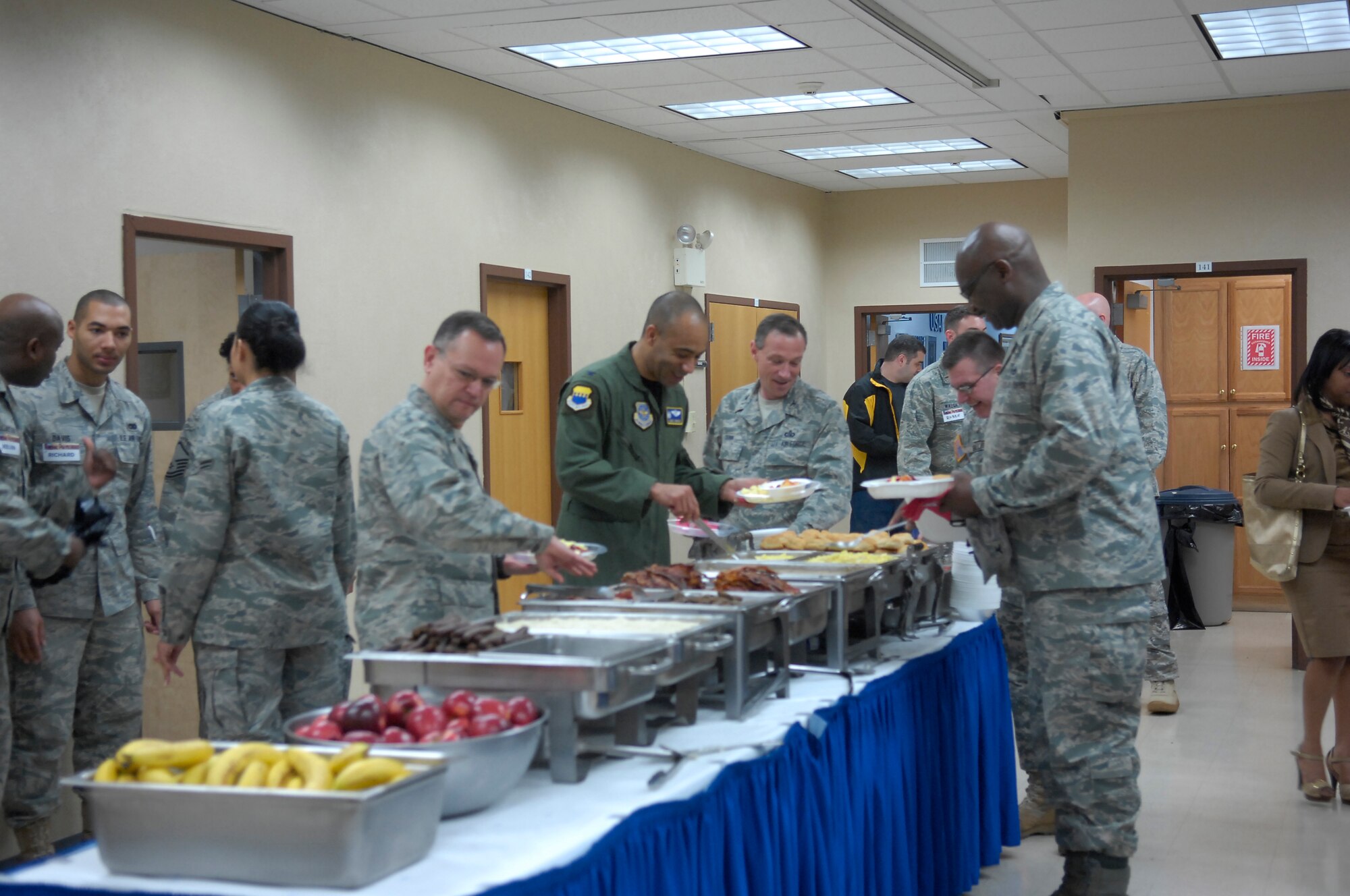 Pope Airmen gather in the early morning at the Pope Chapel to enjoy the National Prayer Breakfast March 19. Airmen listened to guest speaker, Chaplain (Col.) Conrado Navarro, Air Mobility Command Chaplain and musical guest, Pastor Marvin Gregory. (U.S. Air Force Photo by Senior Airman Kris Levasseur) 