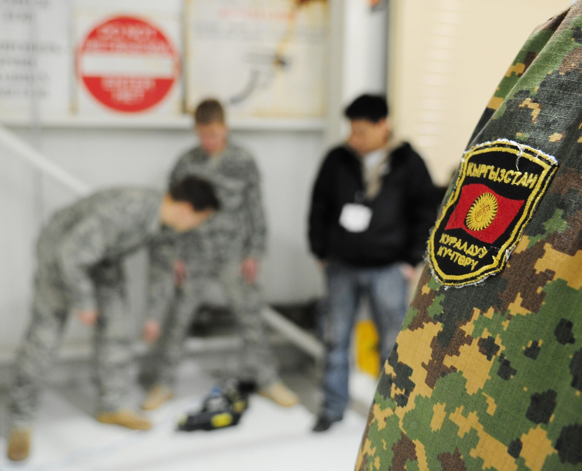 Kyrgyz army explosive ordnance disposal technicians visit the Transit Center at Manas, Kyrgyzstan, for a subject matter information exchange with EOD Airmen March 16, 2010. (U.S. Air Force photo/Staff Sgt. Carolyn Viss)