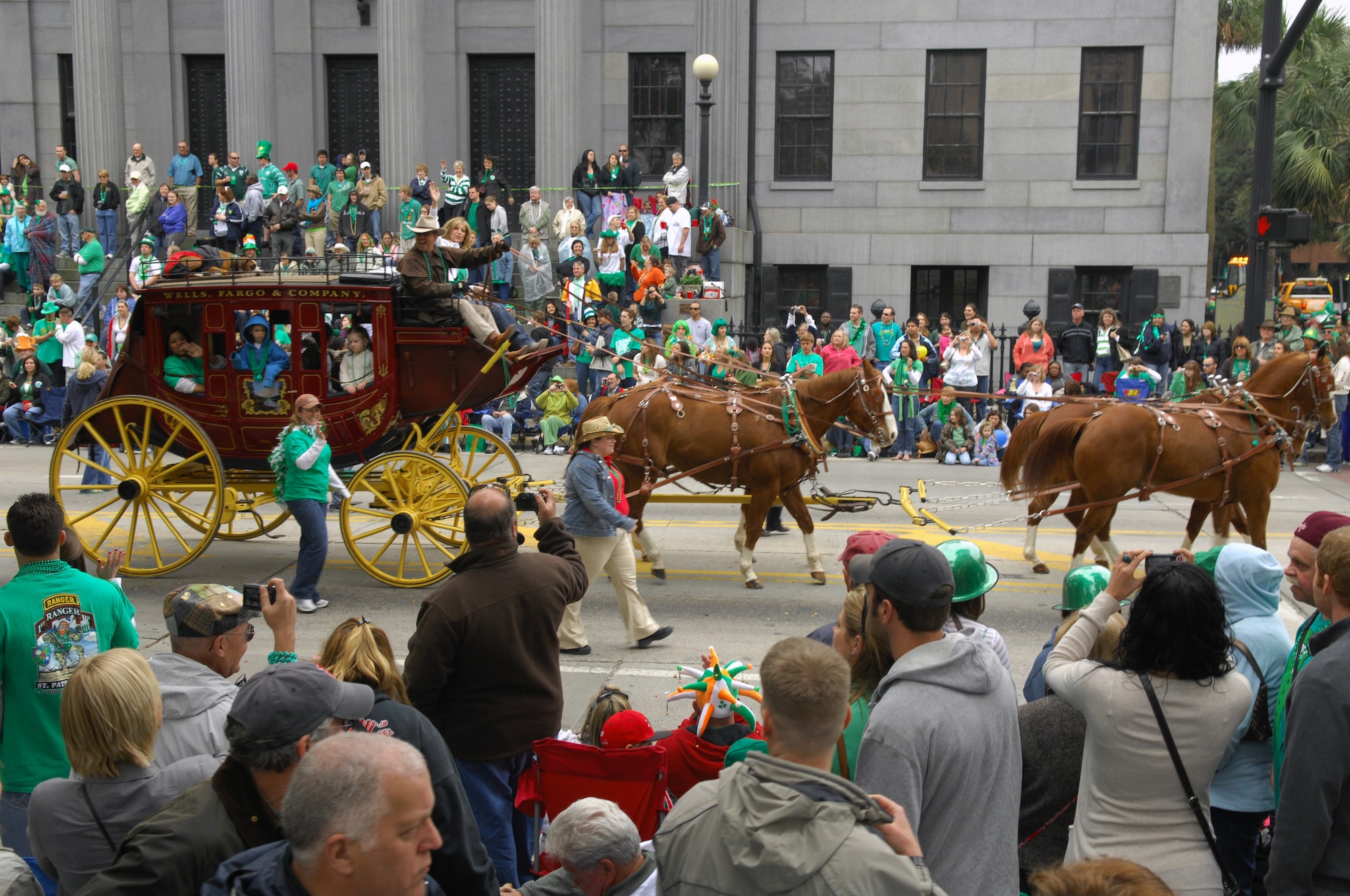 SAVANNAH, Ga. -- A local business rides by in their horse and buggy display while waving to the crowd in the St. Patrick's Day parade March 17 in Savannah, Ga. Savannah hosts the second largest St. Patrick's Day parade in the nation. Shaw Air Force Base outdoor recreation took members from Team Shaw to the St. Patrick's Day parade. (U.S. Air Force photo/Airman 1st Class Daniel Phelps)