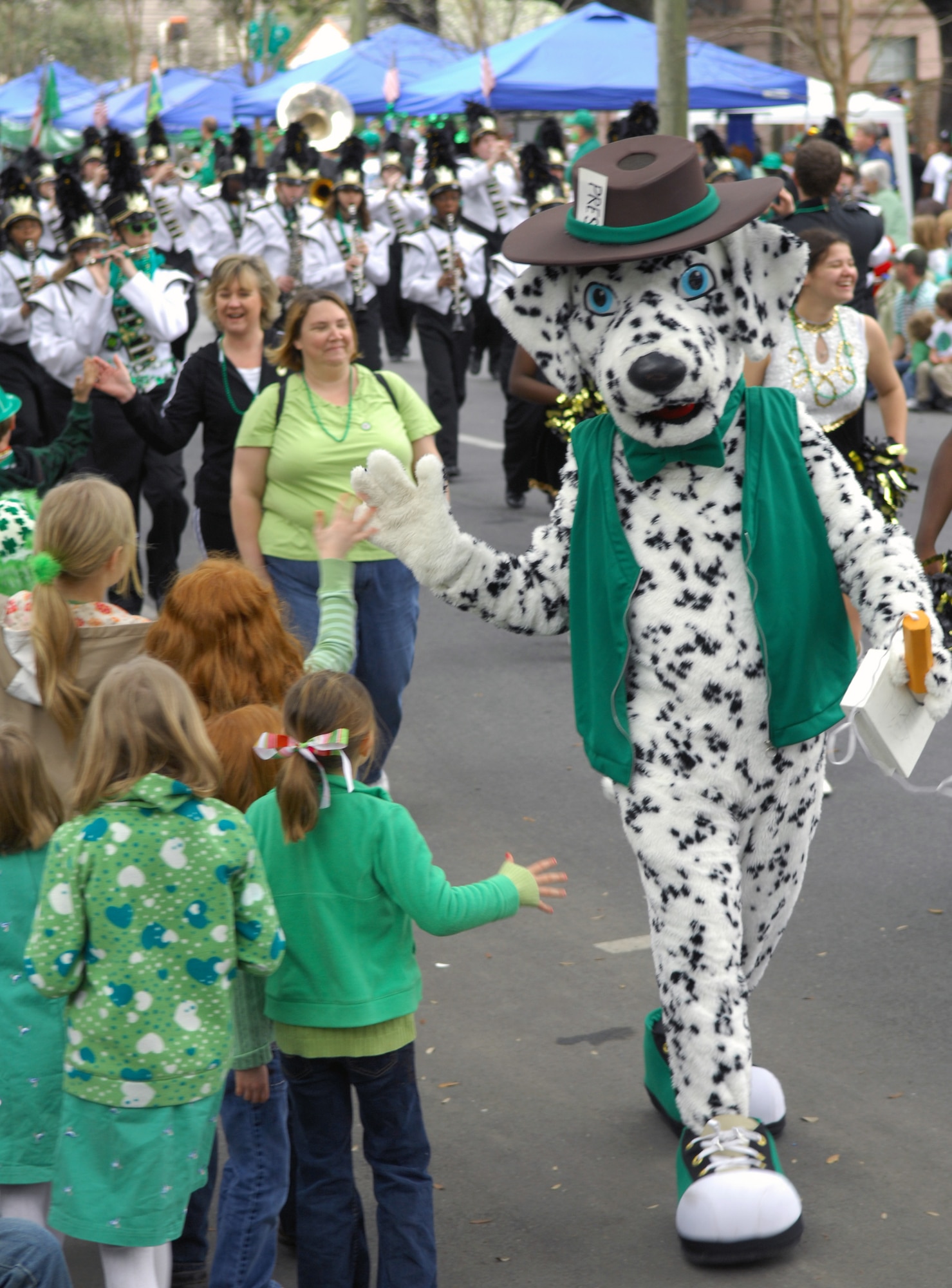 SAVANNAH, Ga. -- A parade particpant dressed as a dalmation greets spectators at the St. Patrick's Day parade in Savannah, Ga., March 17. Savannah hosts the second largest St. Patrick's Day parade in the nation. Shaw Air Force Base outdoor recreation took members from Team Shaw to the St. Patrick's Day parade. (U.S. Air Force photo/Airman 1st Class Daniel Phelps)