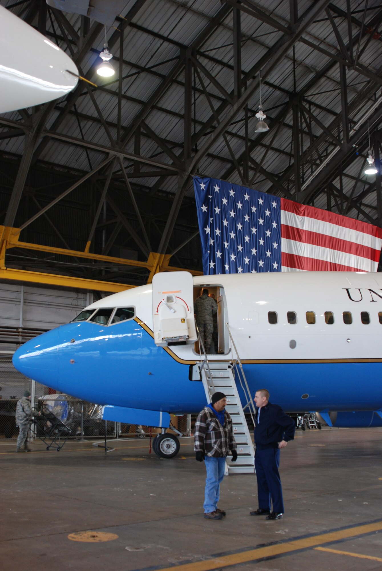 When the weather goes bad, Air Force Reserve planes can be moved inside.  The 932nd Maintenance Group personnel take care of the C-40C plane at Scott Air Force Base on a frosty, cool morning.  The wing flies three C-40C aircraft with a range of 5,000 miles.  (U.S. Air Force photo/Maj. Stan Paregien)