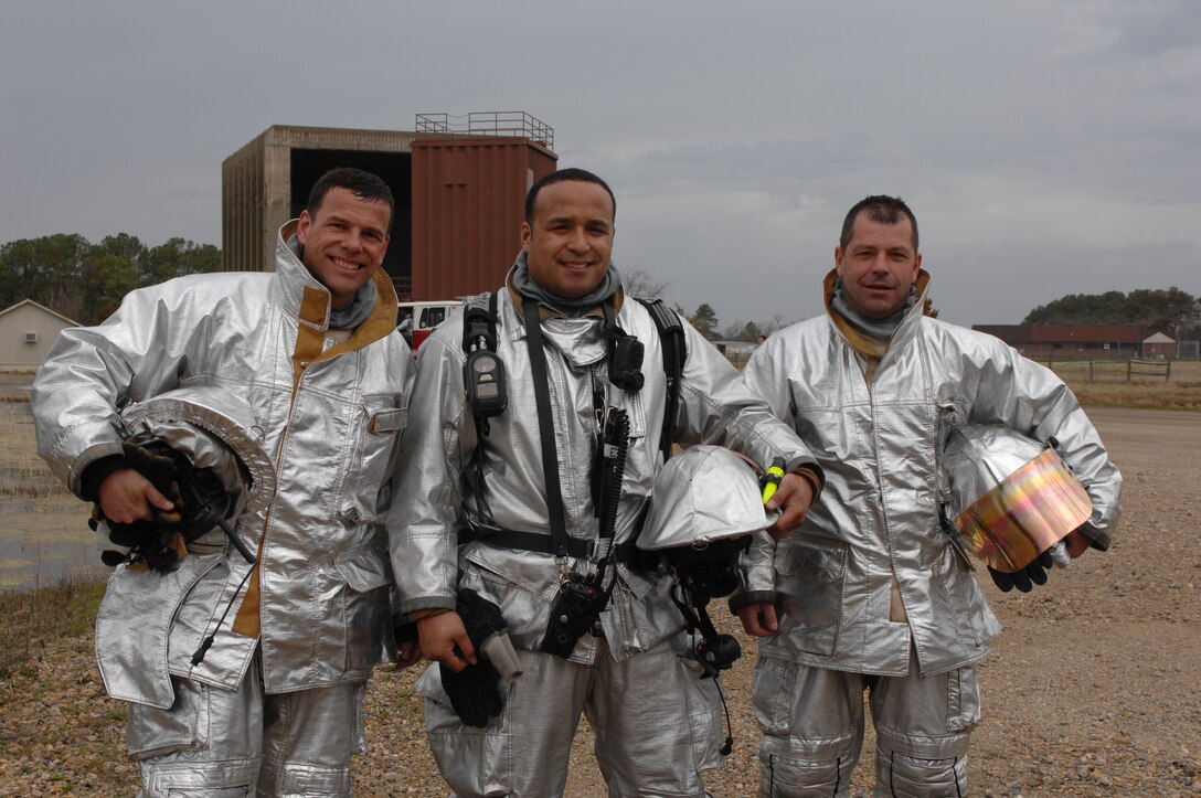 LANGLEY AIR FORCE BASE, Va. – Col. Matt Molloy, 1st Fighter Wing commander, Tech. Sgt. A.J. Eversley, 633d Civil Engineer Squadron station caption, and Col. Wade Tolliver, 1 FW vice commander, take a breather after a live-fire training exercise March 22. (U.S. Air Force photo/Tech. Sgt. April Wickes)