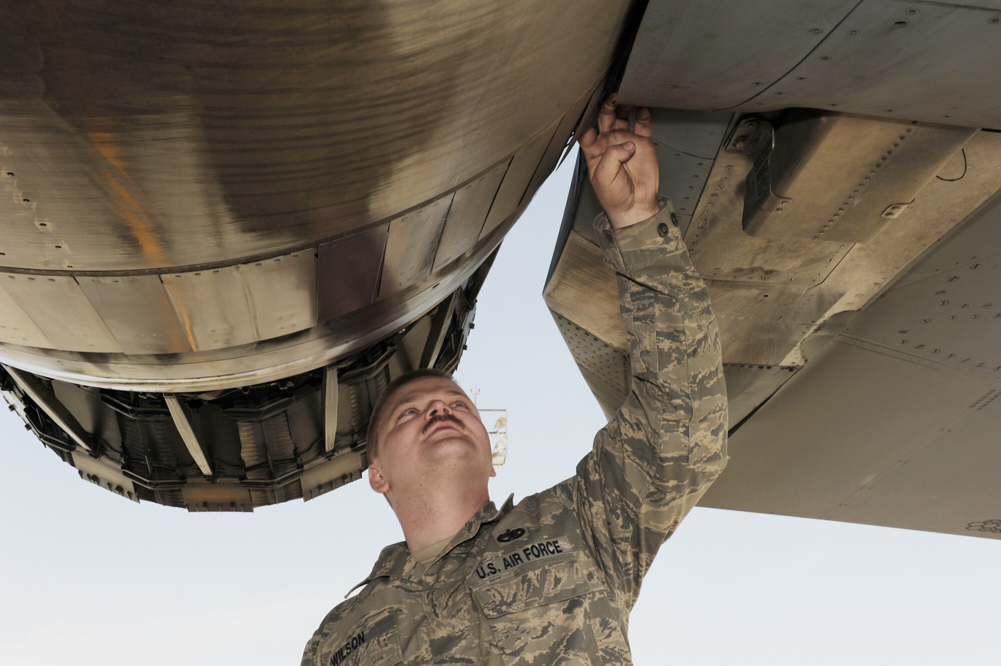 Staff Sgt. Justin Wilson performs a walk around inspection of an F-15E Strike Eagle March 16, 2010, at Bagram Airfield, Afghanistan. Sergeant Wilson is a 494th Aircraft Maintenance Unit crew chief deployed from Royal Air Force Lakenheath, England, and is a native of Malone, N.Y. (U.S. Air Force photo/Staff Sgt. Richard Williams)