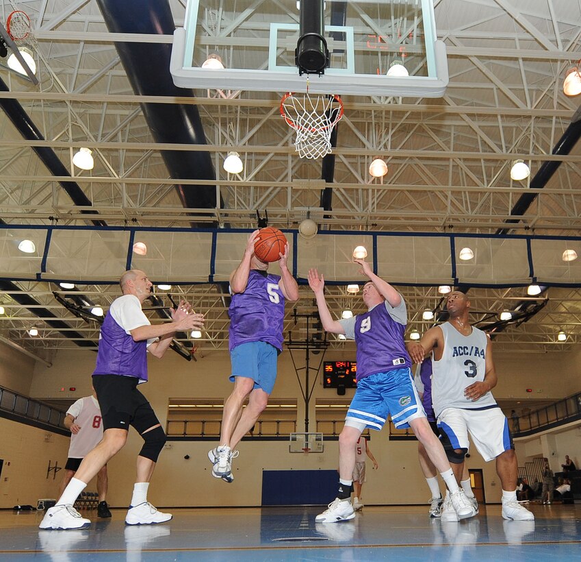 LANGLEY AIR FORCE BASE, Va. -- The Chiefs and Eagles battle it out during a March Madness game at the Shellbank Fitness Center March 19. This is the first year the two ranks have competed against each other here at Langley; Chiefs won, 50-38. (U.S. Air Force photo/Airman Rebecca Montez)