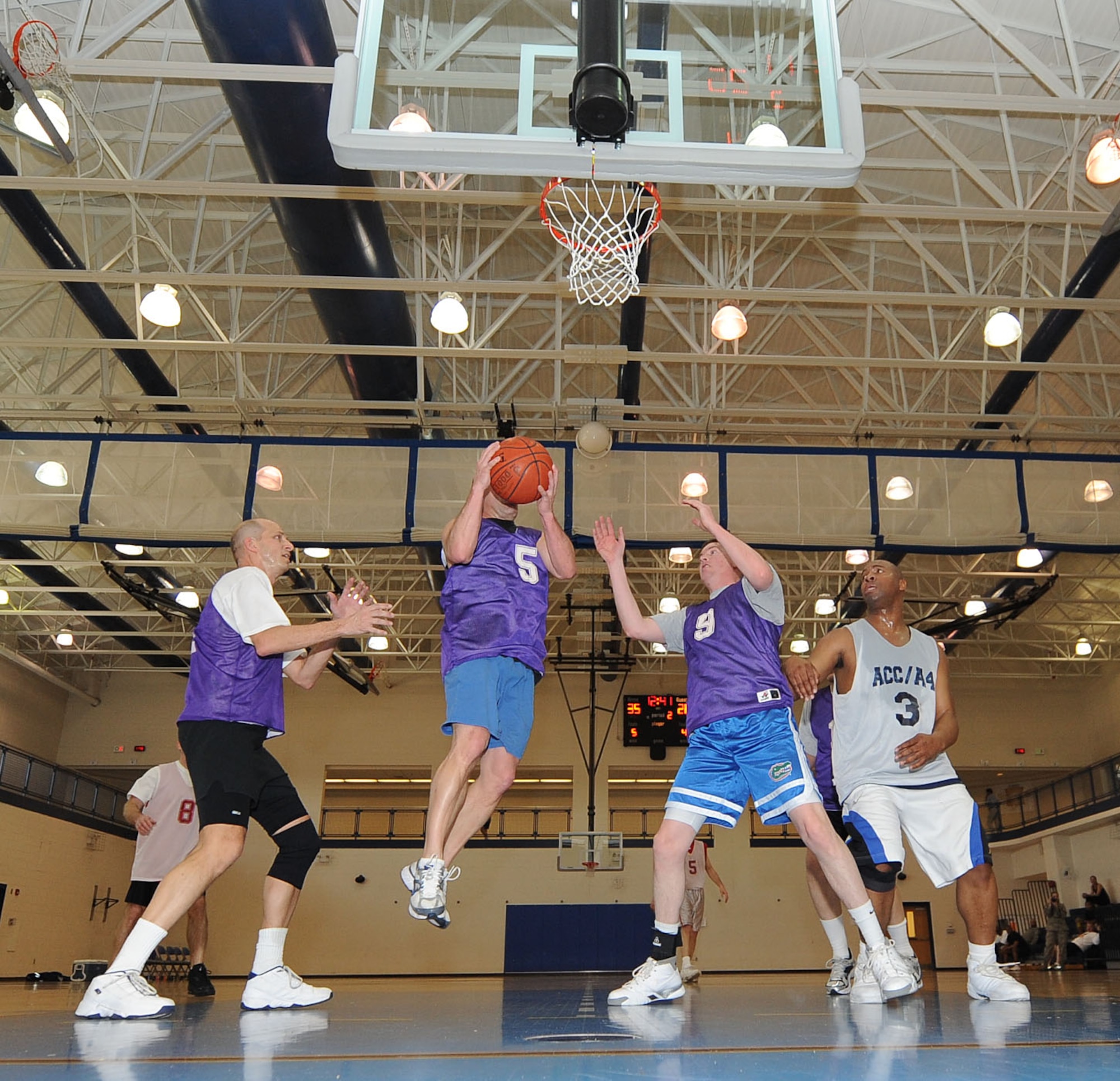 LANGLEY AIR FORCE BASE, Va. -- The Chiefs and Eagles battle it out during a March Madness game at the Shellbank Fitness Center March 19. This is the first year the two ranks have competed against each other here at Langley; Chiefs won, 50-38. (U.S. Air Force photo/Airman Rebecca Montez)