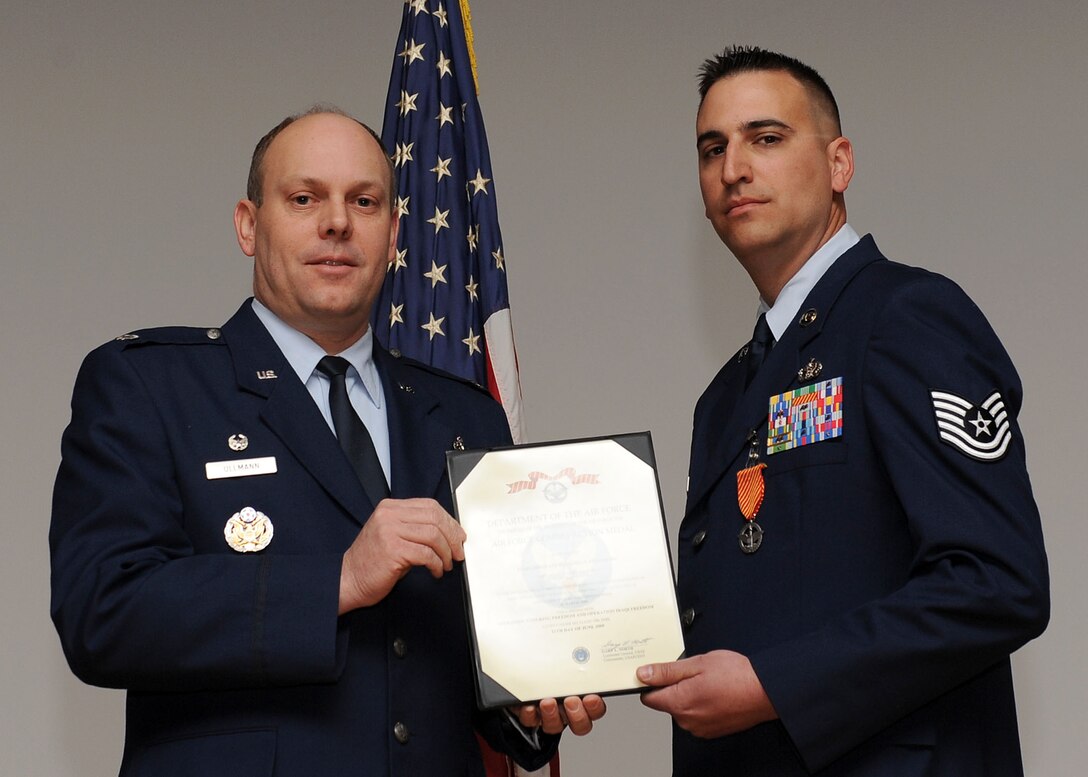 LANGLEY AIR FORCE BASE, Va. -- Tech. Sgt. Benjamin Fundaburg, 633 Civil Engineer Squadron Explosive Ordnance Disposal team, is awarded the Air Force Combat Action Medal here March 19. (U.S. Air Force photo/Airman Rebecca Montez)