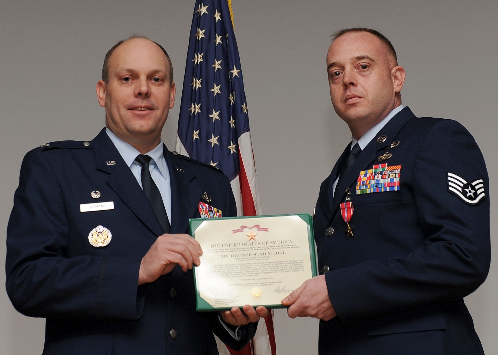 LANGLEY AIR FORCE BASE, Va. -- Staff Sgt. Blake Lundstrom, 633 Civil Engineer Squadron Explosive Ordnance Disposal team, is awarded the Bronze Star Medal here March 19. (U.S. Air Force photo/Airman Rebecca Montez)