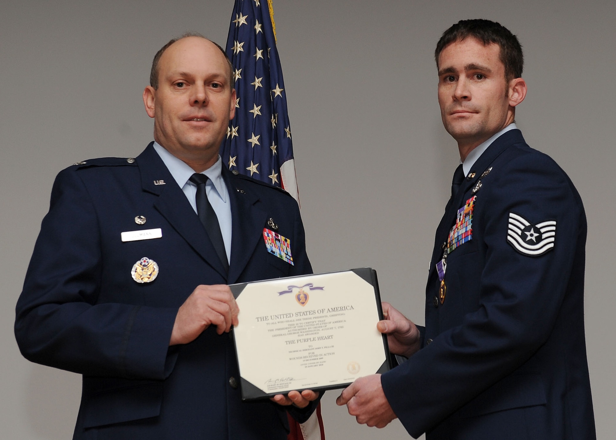 LANGLEY AIR FORCE BASE, Va. -- Tech. Sgt. Tom Pilla, 633 Civil Engineer Squadron Explosive Ordnance Disposal team,  is awarded the Purple Heart here March 19. (U.S. Air Force photo/Airman Rebecca Montez)