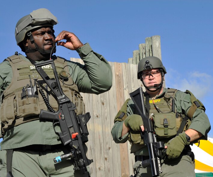 VALDOSTA, Ga. -- Members of the Lowndes County Sherriff’s Office special response team operations, waits for direction during a disaster drill held at Wild Adventures Water and Theme Park here March 15. The objective of the drill was to create a unified command, assess a potential situation, practice working with outside rescue teams and strengthen the process of timely rescue.  (U.S. Air Force photo by Staff Sgt. Schelli Jones/Released)