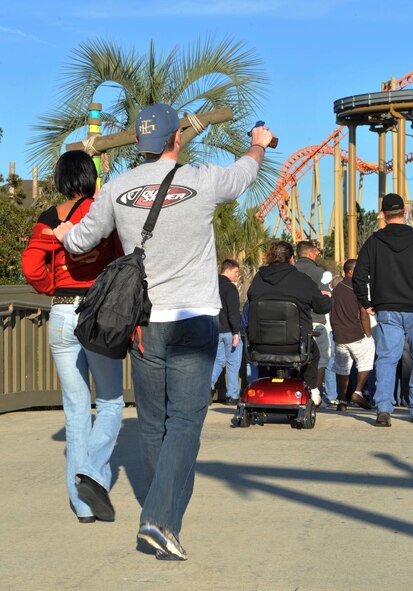 VALDOSTA, Ga. -- Capt. Christopher Snell, 823rd Security Forces Squadron commander, plays a "bad guy" during a disaster drill held at Wild Adventures Water and Theme Park here March 15. In this drill, Captain Snell played the role of a guy who became violent once he discovered his girlfriend at the park with another man. (U.S. Air Force photo by Staff Sgt. Schelli Jones/Released))