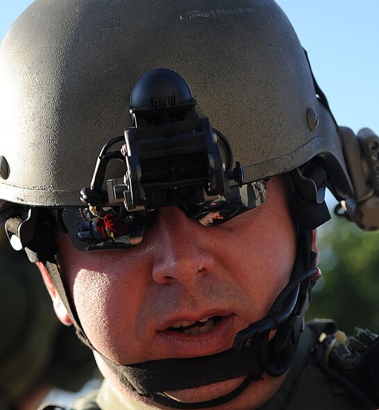VALDOSTA, Ga. -- Joseph Dukes, Lowndes County Sheriff’s office team leader, attends to the victim reflected in his sunglasses during a Lowndes County disaster drill held at Wild Adventures Water and Theme Park here March 15. More than 165 members of the 23rd and 823rd Security Forces Squadrons participated in the drill which benefited off-base authorities and Airmen from Moody Air Force Base, Ga., to practice responding to emergency situations ensuring the best possible result for all individuals involved. (U.S. Air Force photo by Airman 1st Class Joshua Green/Released)