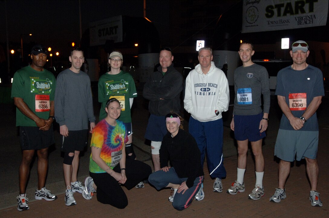VIRGINIA BEACH, Va. -- Nine members of the Saber Chargers team stand near the starting line of the Yuengling Shamrock Half-Marathon March 21. The team consisted of 12 Airmen from the 1st Maintenance Operations Squadron. (U.S. Air Force photo/Airman 1st Class Jason J. Brown)
