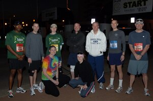 VIRGINIA BEACH, Va. -- Nine members of the Saber Chargers team stand near the starting line of the Yuengling Shamrock Half-Marathon March 21. The team consisted of 12 Airmen from the 1st Maintenance Operations Squadron. (U.S. Air Force photo/Airman 1st Class Jason J. Brown)
