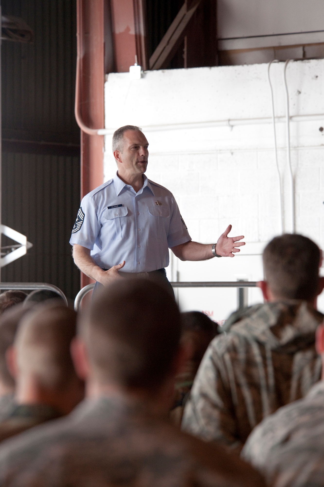 HOLLOMAN AIR FORCE BASE, N.M. -- Chief Master Sgt. Martin Klukas, the Air Combat Command command chief, speaks to members of the 49th Maintenance Group during an "all call" March 15, 2010.  Chief Klukas was the guest speaker at the annual Chief Recognition Ceremony where Holloman's five newly promoted chief master sergeants were honored. (U.S. Air Force photo by Staff Sgt. Joe Laws) (Released)