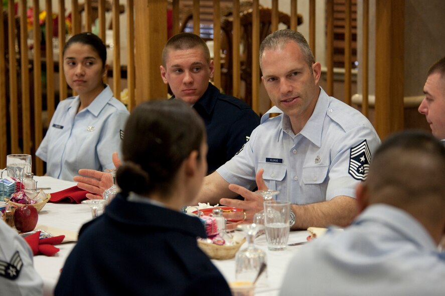 HOLLOMAN AIR FORCE BASE, N.M. -- Chief Master Sgt. Martin Klukas, the Air Combat Command command chief,  speaks to Holloman Airmen during breakfast at the Shifting Sands Dining Facility March 15, 2010. Chief Klukas was the guest speaker at the annual Chief Recognition Ceremony where Holloman's five newly promoted chief master sergeants were honored. (U.S. Air Force photo by Staff Sgt. Joe Laws) (Released)