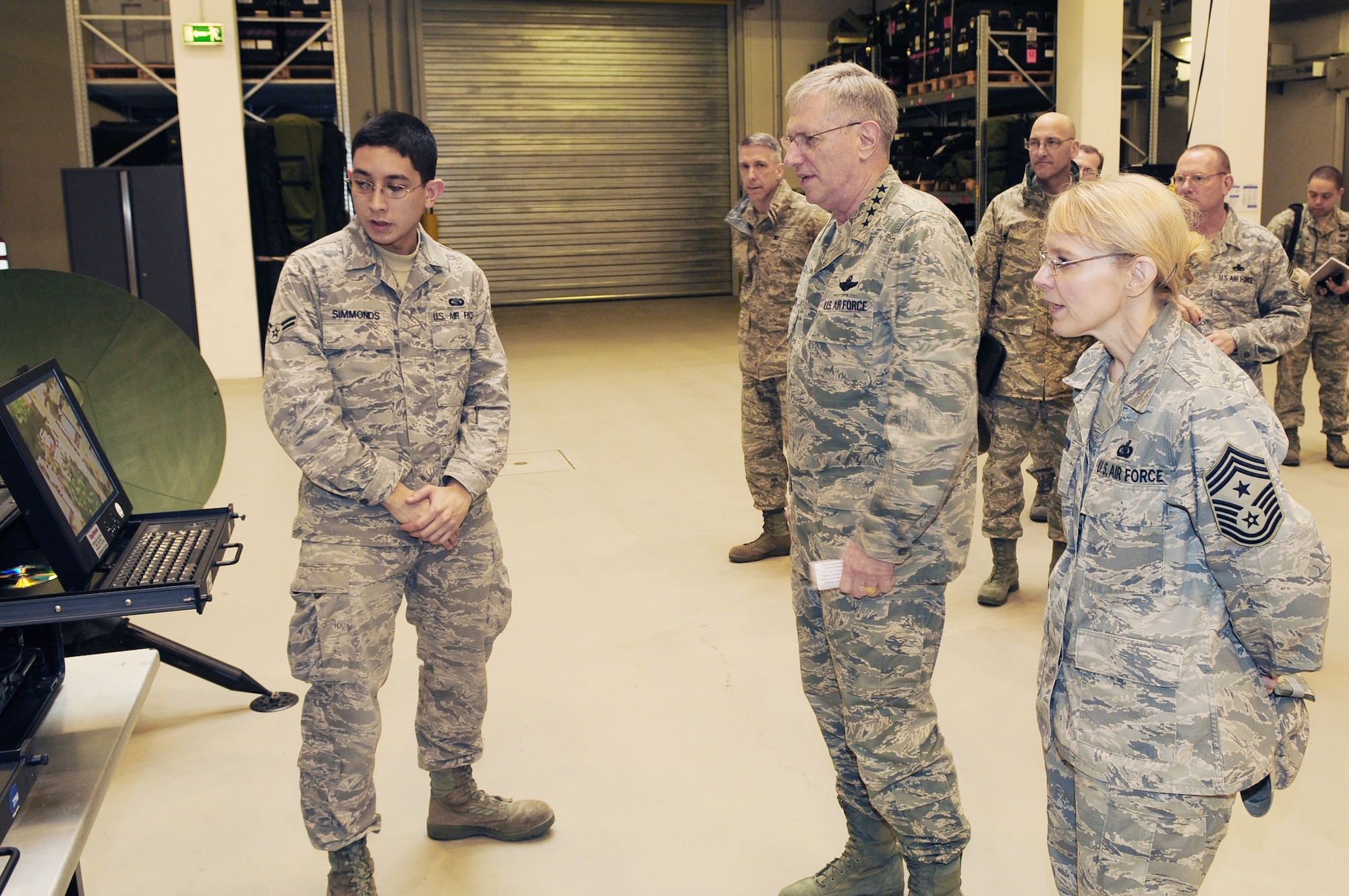 Gen. Roger A. Brady, U.S. Air Forces in Europe commander, and Chief Master Sgt. Pamela Derrow, USAFE command chief master sergeant, receive a briefing about the Global Broadcast Service Communications suite from Airman 1st Class Saunder Simmonds, 1st Combat Communications Squadron, March 16, 2010. General Brady and Chief Derrow spent the day visiting the facilities of the 435th Air Ground Operations Wing at Ramstein Air Base, Germany, their first visit to USAFE's newest wing since it stood up in July 2009. (U.S. Air Force photo/Airman Desiree Esposito)