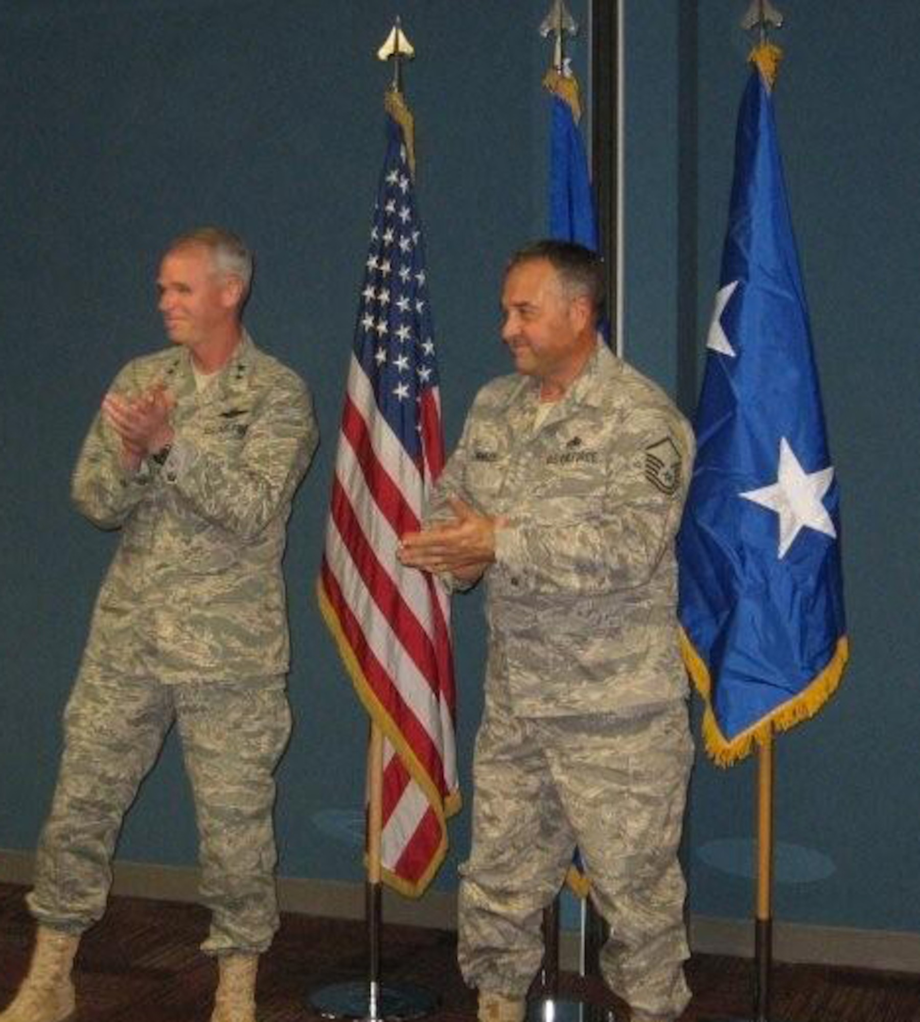 Maj. Gen. William Holland, commander of 9th Air Force, re-enlists Master Sgt. Steve Hawley, a Reservist with the 916th Maintenance Squadron.  (USAF photo by MSgt. Sylvia Swinson, 916 MSF)