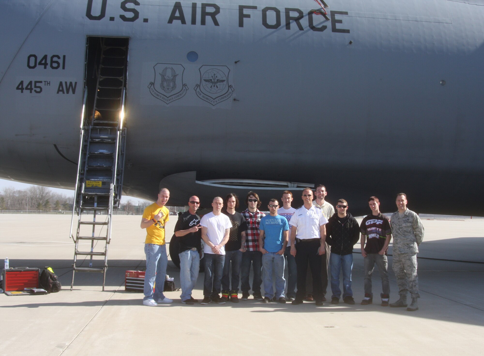 WRIGHT-PATTERSON AIR FORCE BASE, Ohio – Ten motorcycle riders participating in the American Motorcyclist Association Arenacross series, toured a C-5 Galaxy belonging to the 445th Airlift Wing as part of a visit to Wright-Patterson Air Force Base Mar. 19.  Lt. Col. Rick Johns, 88th Air Base Wing Communications Squadron commander, and Mr. Randy Watts, 88th Air Base Wing Fire Department, escorted the group during their visit.  (U.S. Air Force photo/Stacy Vaughn)