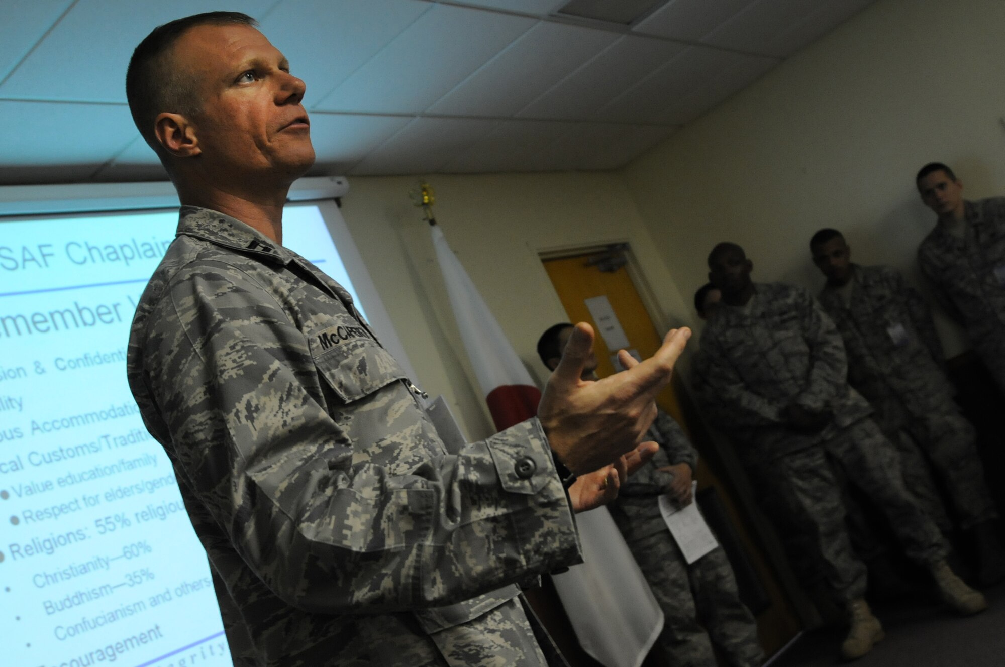 Captain Randy McCafferty, an 18th Wing Chaplain, provides spiritual readiness information to Kadena Airmen processing the Installation Deployment Readiness Center during Beverly High 10-02 at Kadena Air Base, Japan, March 22. The 18th Wing is participating in a Local Operational Readiness Exercise March 22-26 to test the readiness of Kadena Airmen March 22-26, 2010. (U.S. Air Force photo/Staff Sgt. Christopher Hummel)
