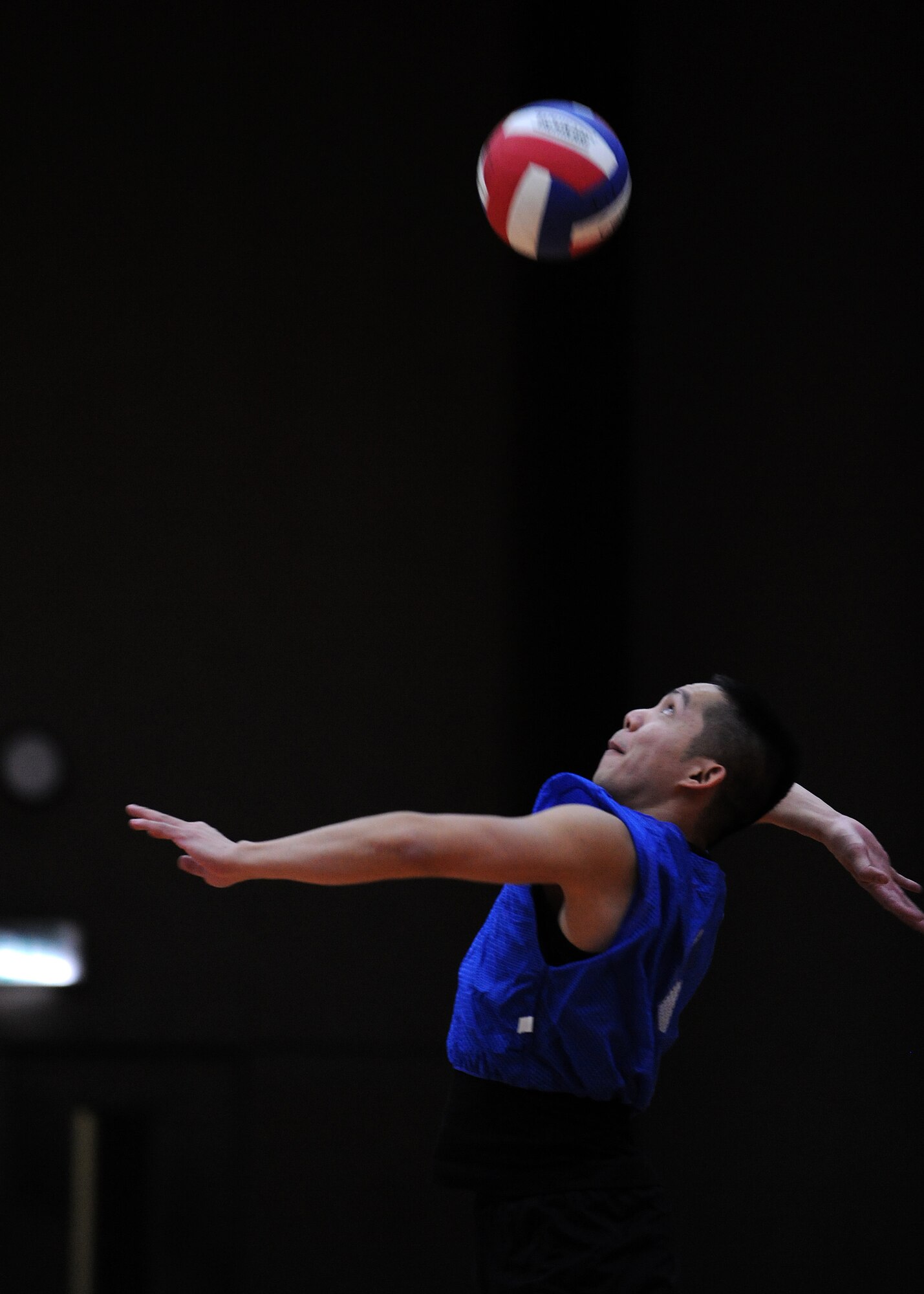 SPANGDAHLEM AIR BASE, Germany – Michael Deguzman, 52nd Civil Engineer Squadron, prepares to spike the ball during the second game of an intramural volleyball match at Skelton Memorial Fitness Center March 17. The 52nd CES defeated the 52nd Logistics Readiness Squadron by sweeping the match 2-0. (U.S. Air Force photo/Senior Airman Nathanael Callon)