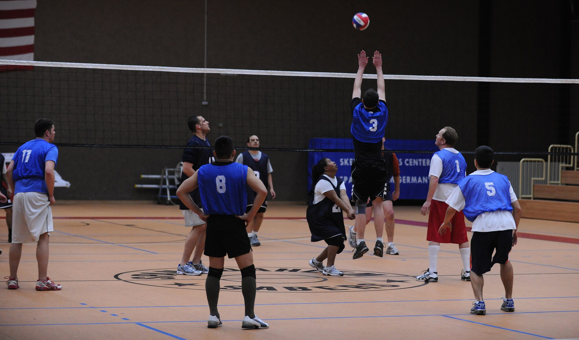 SPANGDAHLEM AIR BASE, Germany – A member of the 52nd Civil Engineer Squadron blocks the ball during an intramural volleyball match at Skelton Memorial Fitness Center March 17. The 52nd CES defeated the 52nd Logistics Readiness Squadron by sweeping the match 2-0. (U.S. Air Force photo/Senior Airman Nathanael Callon)