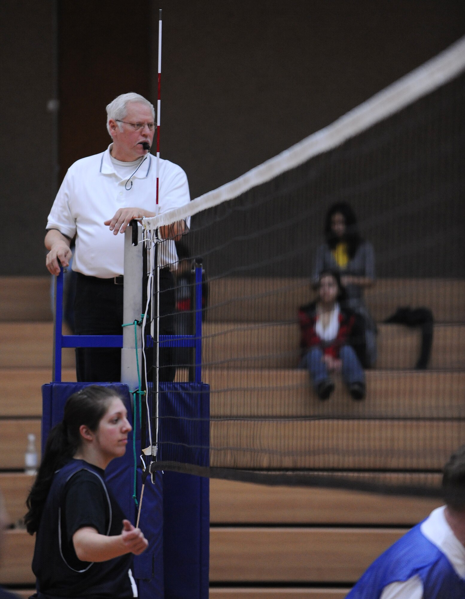 SPANGDAHLEM AIR BASE, Germany – Referee John Chavez keeps a watchful eye on the game during an intramural volleyball match between the 52nd Logistics Readiness Squadron and the 52nd Civil Engineer Squadron at Skelton Memorial Fitness Center March 17. The 52nd CES defeated the 52nd LRS by sweeping the match 2-0. (U.S. Air Force photo/Senior Airman Nathanael Callon)