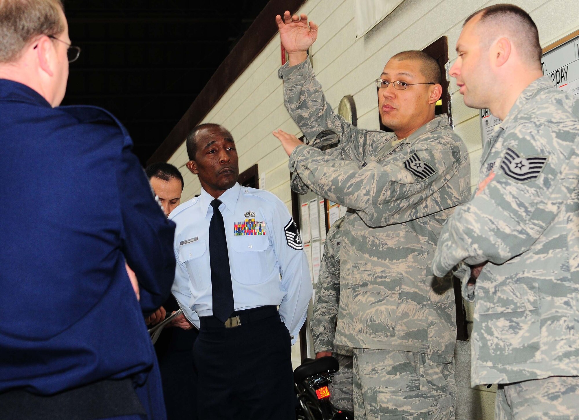 YOKOTA AIR BASE, Japan -- Tech Sgt Fred Carter, 374th Maintenance Squadron, briefs the Rapid Improvement Event team on the isochronal inspection which consists of a detailed inspection before the plane is ready for re-launch. (U.S. Air Force photo/Airman 1st Class Devin Doskey)