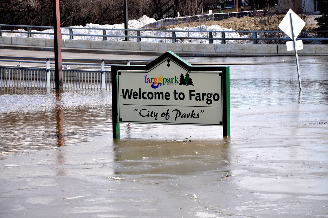 A 'Welcome to Fargo' sign on Second Street in downtown Fargo, N.D., stands in flood water, March 20, 2010. The U.S. Army Corps of Engineers, St. Paul District, has been helping communities along the Red River fight the 2010 spring flooding. 

