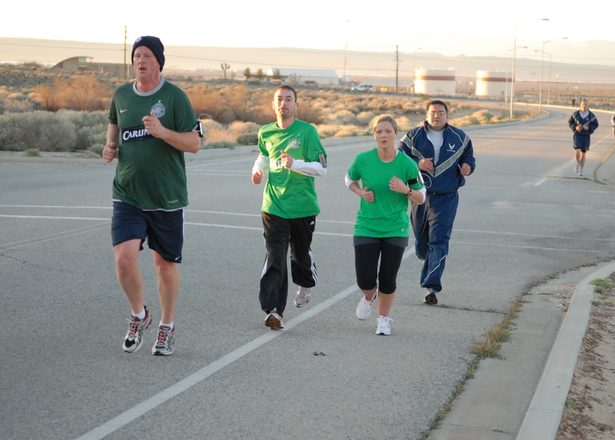 Airmen participate in Edwards St. Patrick's Day Fun Run March 17. Roughly 60 people took part in the five-kilometer run. (Air Force photo/Senior Airman William A. O'Brien)