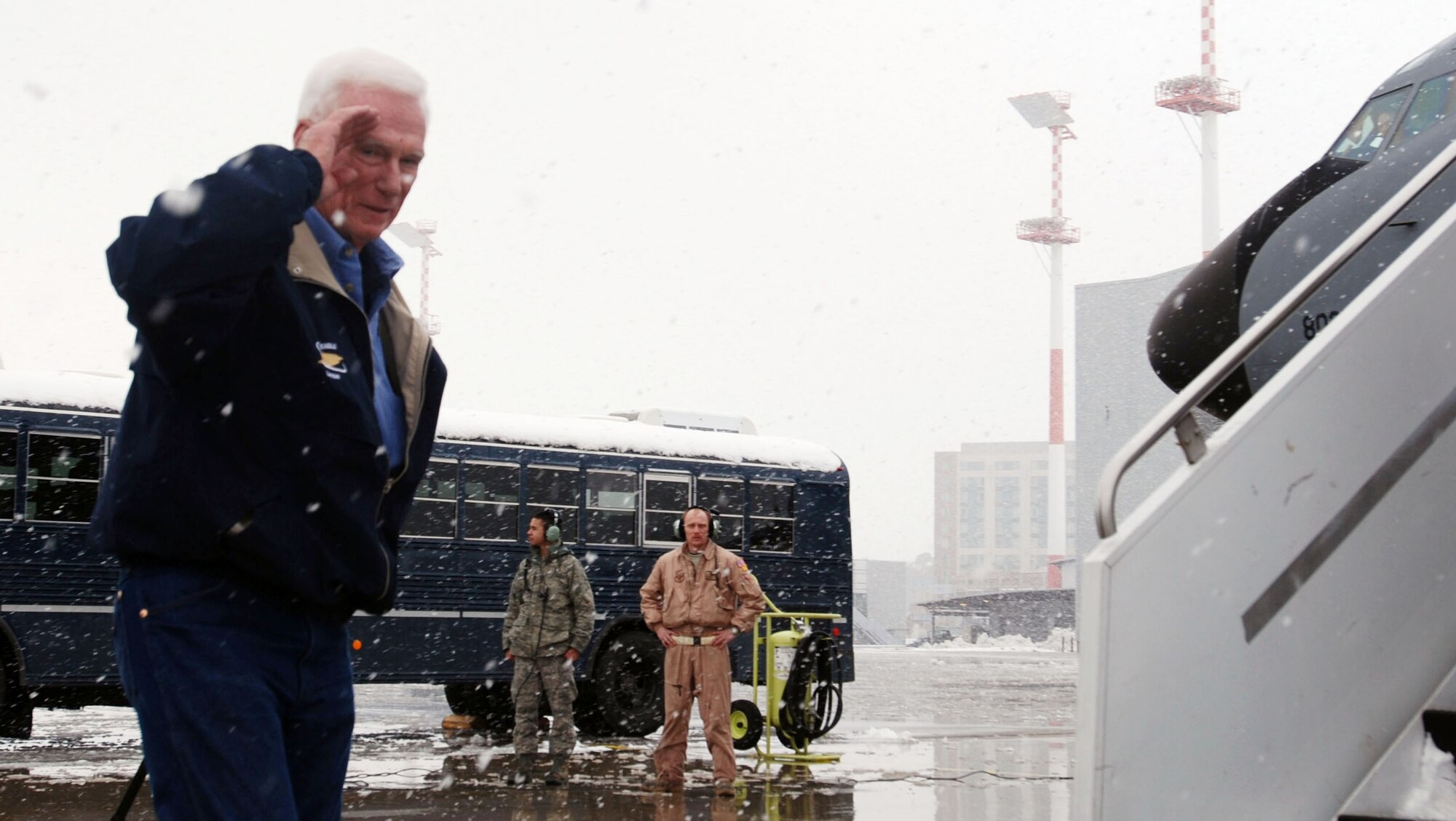 Retired Navy Capt. Gene Cernan, the last man to walk on the moon with the Apollo program, prepares to board a KC-135 Stratotanker assigned to the 22nd Air Refueling Wing, McConnell Air Force Base, Kan., March 7, 2010, at Ramstein Air Base, Germany.  The KC-135 served as the primary means of transport for the members of the "Legends of Aerospace" tour as they traveled to various locations across Southwest Asia, conducting speaking programs and visiting with deployed servicemembers. (U.S. Air Force photo/2nd Lt. Nicholas Mercurio)