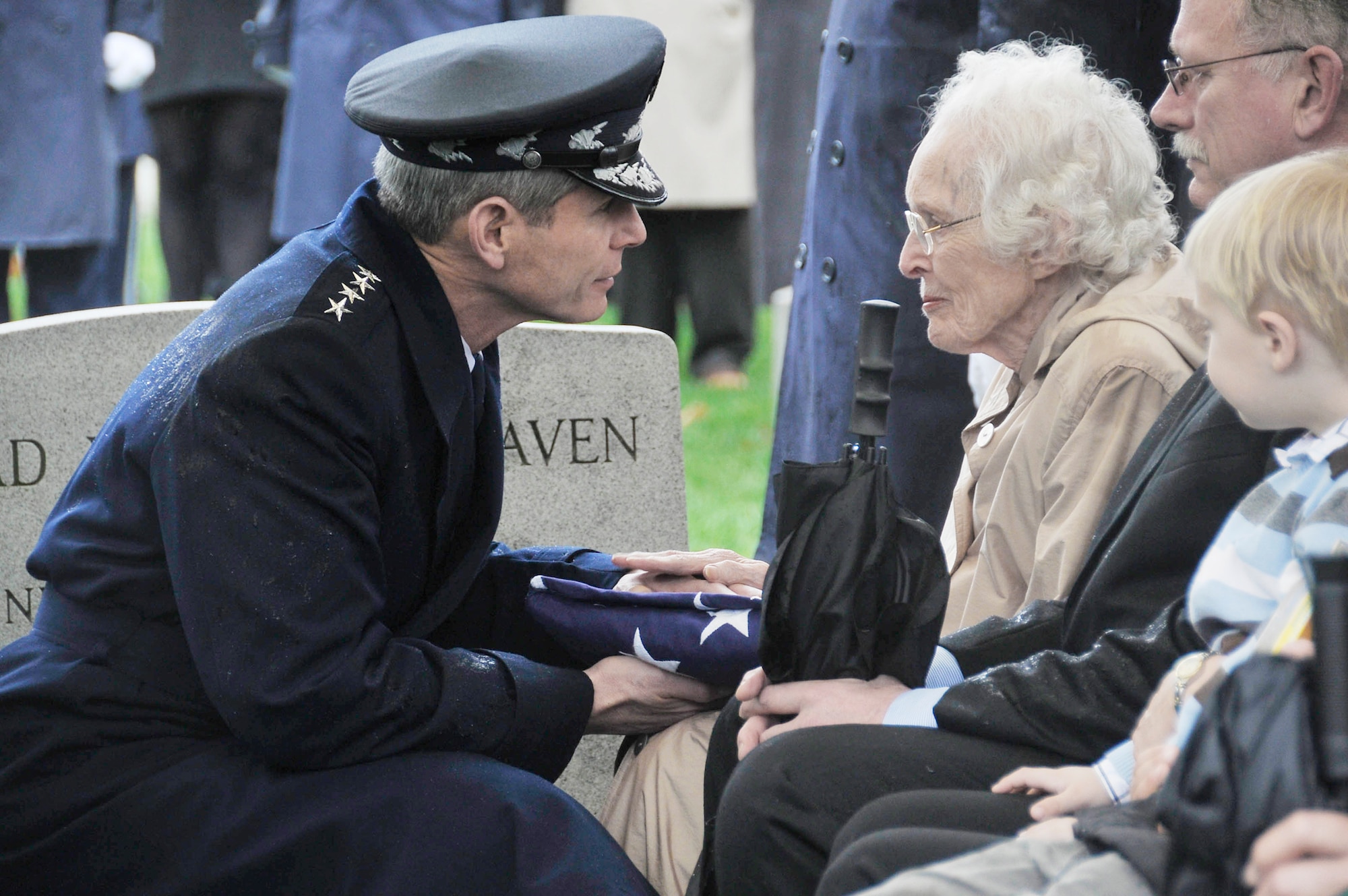 Gen. Norton Schwartz, chief of staff of the Air Force, presents a folded flag to Barbara Allen, wife of Gen. Lew Allen Jr.  General Allen served as chief of staff from July 1978 to July 1982. The memorial service was held March 22 at the Fort Meyer (Va.) Memorial Chapel. He was laid to rest at Arlington National Cemetery.  (U.S. Air Force photo/Senior Airman Marleah Miller)
