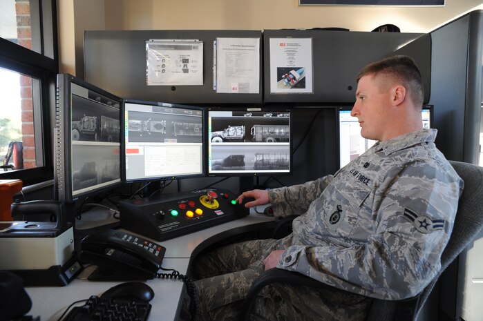 U.S. Air Force Airman 1st Class Tyler Shaw operates the Z Portal system at Joint Base Charleston, S.C., March 23, 2010.  The Z portal's capabilities are used to scan vehicles to identify drugs, bombs and human trafficking. Approximately 120 vehicles are scanned each day, which is just one measure to ensure security on the base. Airman Shaw is a security member for the 628th Security Forces Squadron. (U.S. Air Force photo/James Bowman/released)