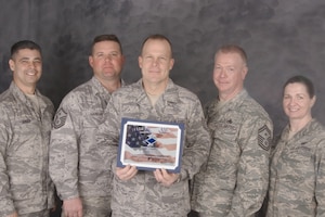 Tech. Sgt. Paul Havran (holding certificate) is awarded the Diamond Sharp award for March 2010. Sergeant Havran is recognized for his his selfless dedication to retention, unwavering professionalism and his work with the student flight in preparing the next generation of Airmen. Sergeant Havran, retention office manager for the 132nd Fighter Wing, Force Support Squadron, Iowa Air National Guard was recently selected by the Air National Guard as ?Rookie Retention Office Manager of the Year?. (U.S. Air Force photo/Staff Sgt. Linda E. Kephart)(released)                               