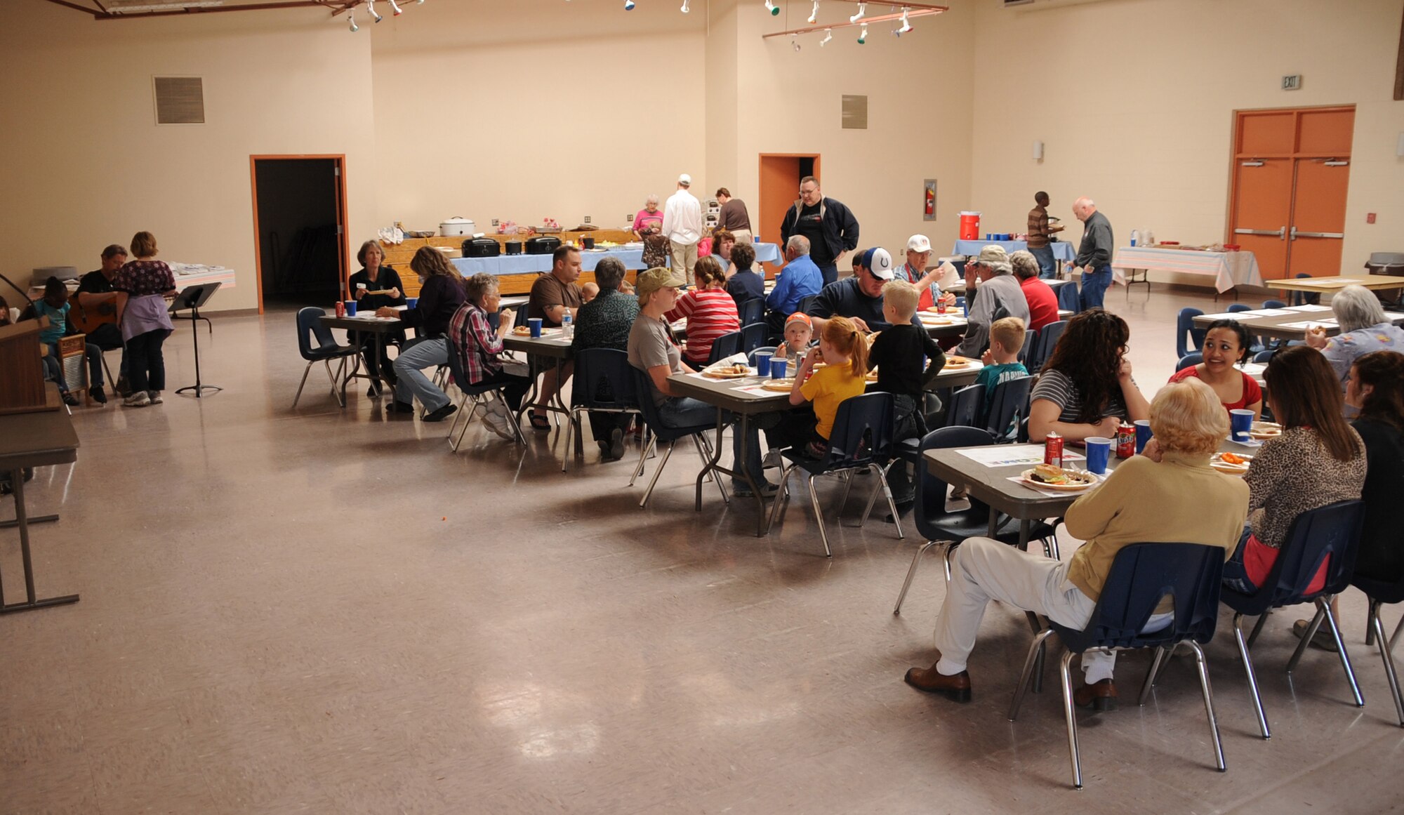 The city of Portales, N.M., hosts its first Orientation Day for Cannon Air Force Base airmen and their families new to the area 13. Representatives from the community spoke about available activities and opportunities for the new arrivals  at the Memorial Building. (U.S. Air Force photo by Airman 1st Class Maynelinne De La Cruz)