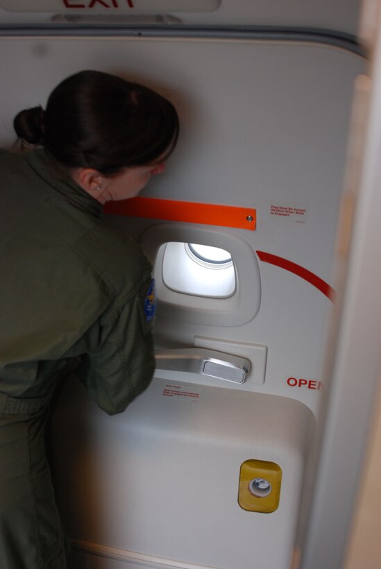 Tech. Sgt. April Tarbill, 73rd Airlift Squadron, prepares a C-40C for departure. Distinguished Visitor Airlift is a unique mission in the Air Force. The 932nd Airlift Wing is the Reserve's only DV Airlift mission-capable unit and provides services to congressional delegations, combatant commanders, cabinet members and, periodically, the White House directly. (U.S. Air Force photo/Tech. Sgt. Christian Michael) 