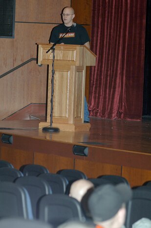 Tech. Sgt. Patrick Howells briefs motorcycles riders at Joint Base Charleston during an annual mandatory motorcycle riders meeting at the base theater, which kicked off Air Mobility Command?s Spring Safety Focus March 19, 2010. More than 200 people showed up for the mandatory briefing, who were briefed on the required proper safety gear and group riding etiquette. Sgt. Howells is assigned to the 437th Maintenance Squadron. (U.S. Air Force photo/Staff Sgt. Marie Brown)