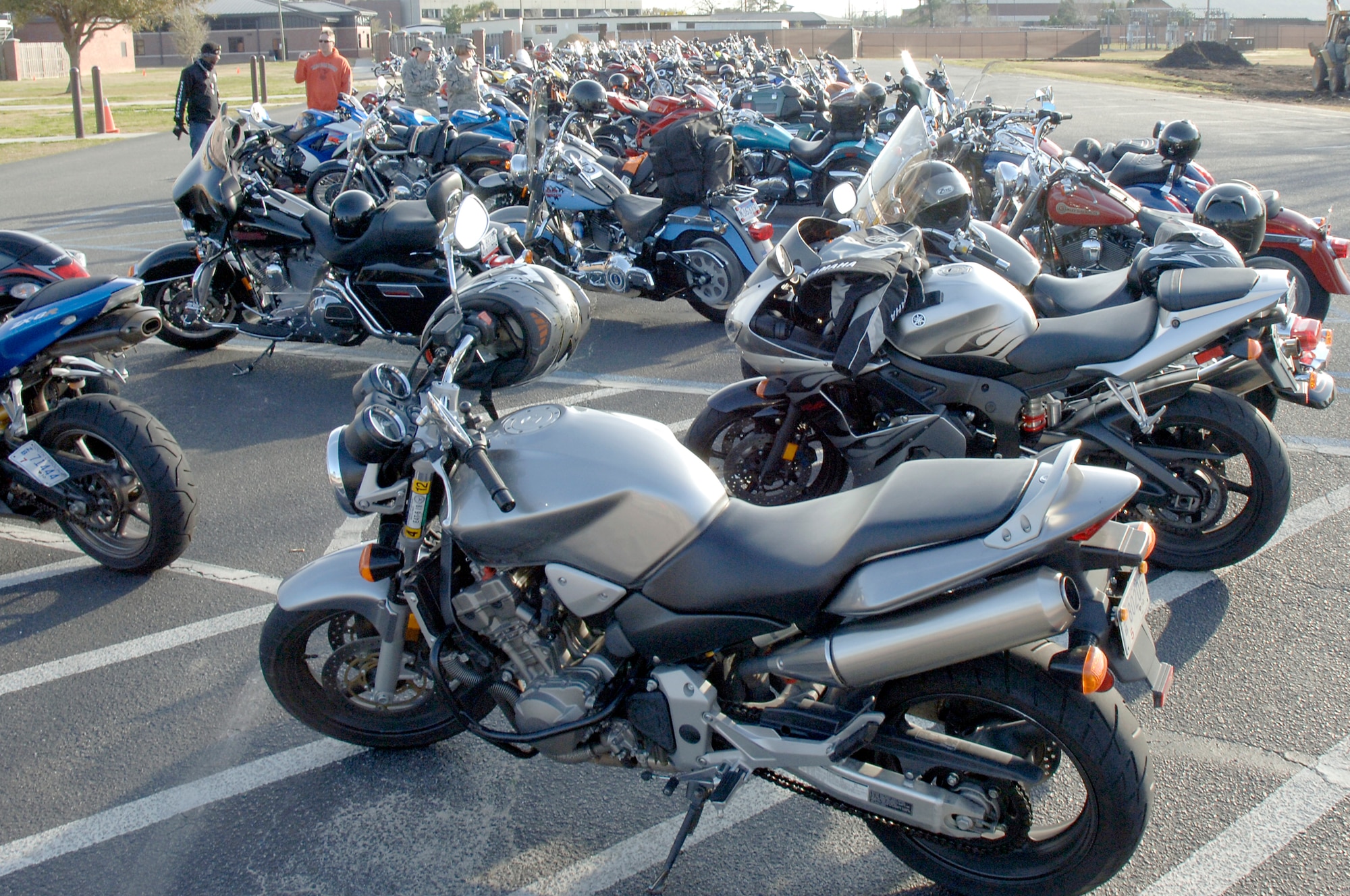 One hundred and thirty-four bikes sit in the parking lot of the base theater as members of Joint Base Charleston receive an annual mandatory briefing, which kicked off Air Mobility Command?s Spring Safety Focus March 19, 2010. More than 200 participants and 134 motorcycles from Joint Base Charleston showed up to compete in a "best in show" contest and had the opportunity to participate in a Motorcycle Mentoring ride to Naval Weapons Station Short Stay after the mandatory meeting. (U.S. Air Force photo/Staff Sgt. Marie Brown)
