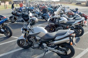 One hundred and thirty-four bikes sit in the parking lot of the base theater as members of Joint Base Charleston receive an annual mandatory briefing, which kicked off Air Mobility Command?s Spring Safety Focus March 19, 2010. More than 200 participants and 134 motorcycles from Joint Base Charleston showed up to compete in a "best in show" contest and had the opportunity to participate in a Motorcycle Mentoring ride to Naval Weapons Station Short Stay after the mandatory meeting. (U.S. Air Force photo/Staff Sgt. Marie Brown)
