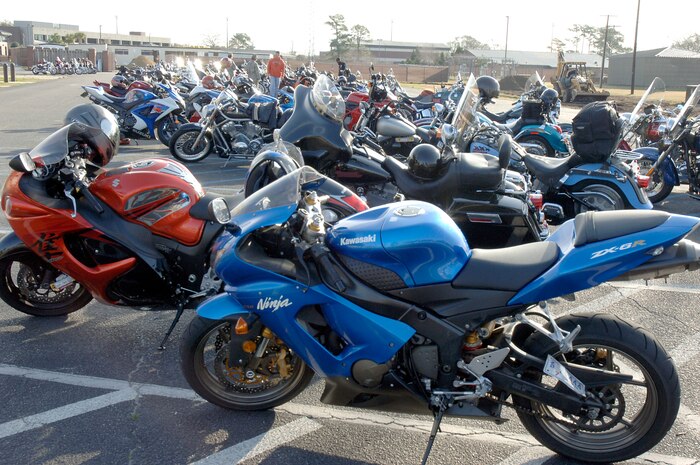 One hundred and thirty-four bikes sit in the parking lot of the base theater as members of Joint Base Charleston receive an annual mandatory briefing, which kicked off Air Mobility Command?s Spring Safety Focus March 19, 2010. More than 200 participants and 134 motorcycles from Joint Base Charleston showed up to compete in a "best in show" contest and had the opportunity to participate in a Motorcycle Mentoring ride to Naval Weapons Station Short Stay after the mandatory meeting. (U.S. Air Force photo/Staff Sgt. Marie Brown)