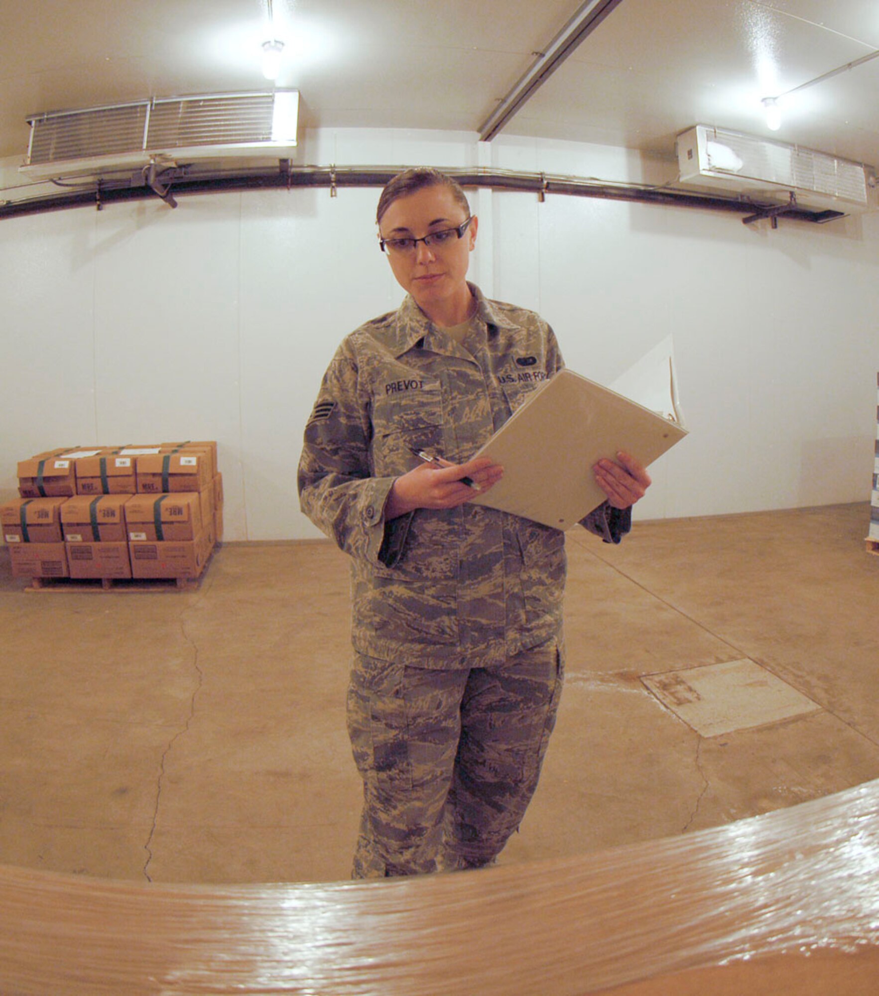 Senior Airman Michelle Prevot, 22nd Force Support Squadron food service accountant, conducts a monthly inventory of McConnell’s meals ready to eat at the 22nd FSS Readiness building March 22, 2010, at McConnell Air Force Base, Kan. In addition to being responsible for the base’s war reserve material stock inventory, the Redwood City, Calif., native manages Air Force Department of Defense food cost reports, forecasts subsistence requirements, identifies financial trends within food service operations, and monitors the $2.5 million mess contract for the dining facility for Air Mobility Command’s largest KC-135 Stratotanker Wing. (U.S. Air Force photo/Senior Airman Abigail Klein)