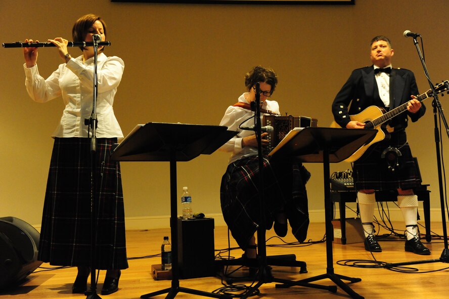 COLUMBIA, S.C. -- (Left to right) Technical Sgt. Sherry Burt, Staff Sgt. Lacey Stokes and Tech. Sgt. Paul Mezzanotte, members of the Heritage Aire Celtic Ensemble, play during a performance for the Columbia community at the Columbia Museum of Art March 21. Heritage Aire celebrates America's great cultural diversity by performing concerts in communities and schools throughout a six-state region. (U.S. Air Force photo/Airman 1st Class Neil D. Warner)