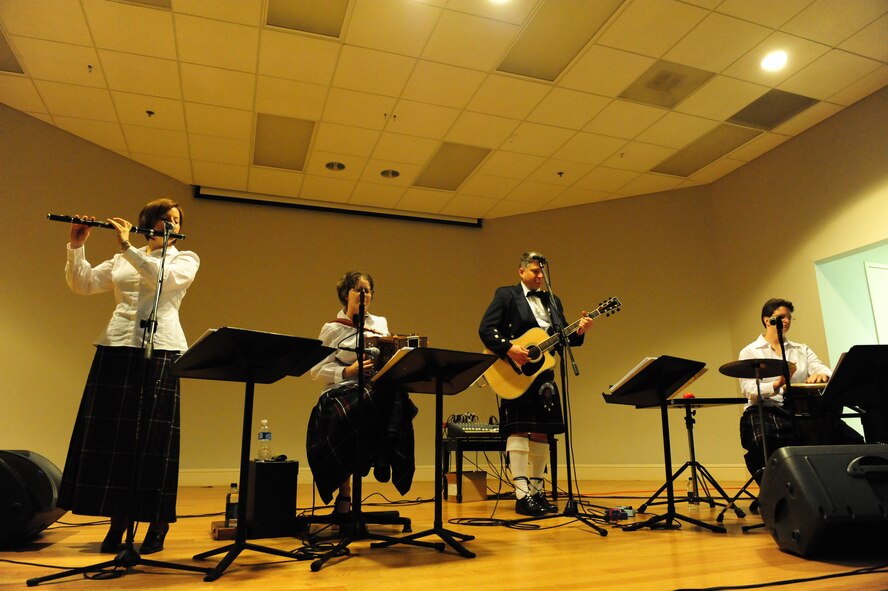 COLUMBIA, S.C. -- (Left to right) Technical Sgt. Sherry Burt, Staff Sgt. Lacey Stokes, Tech. Sgt. Paul Mezzanotte, and Staff Sgt. Tamra Gobert, members of the Heritage Aire Celtic Ensemble, play during a performance for the Columbia community at the Columbia Museum of Art March 21. Heritage Aire celebrates America's great cultural diversity by performing concerts in communities and schools throughout a six-state region. (U.S. Air Force photo/Airman 1st Class Neil D. Warner)