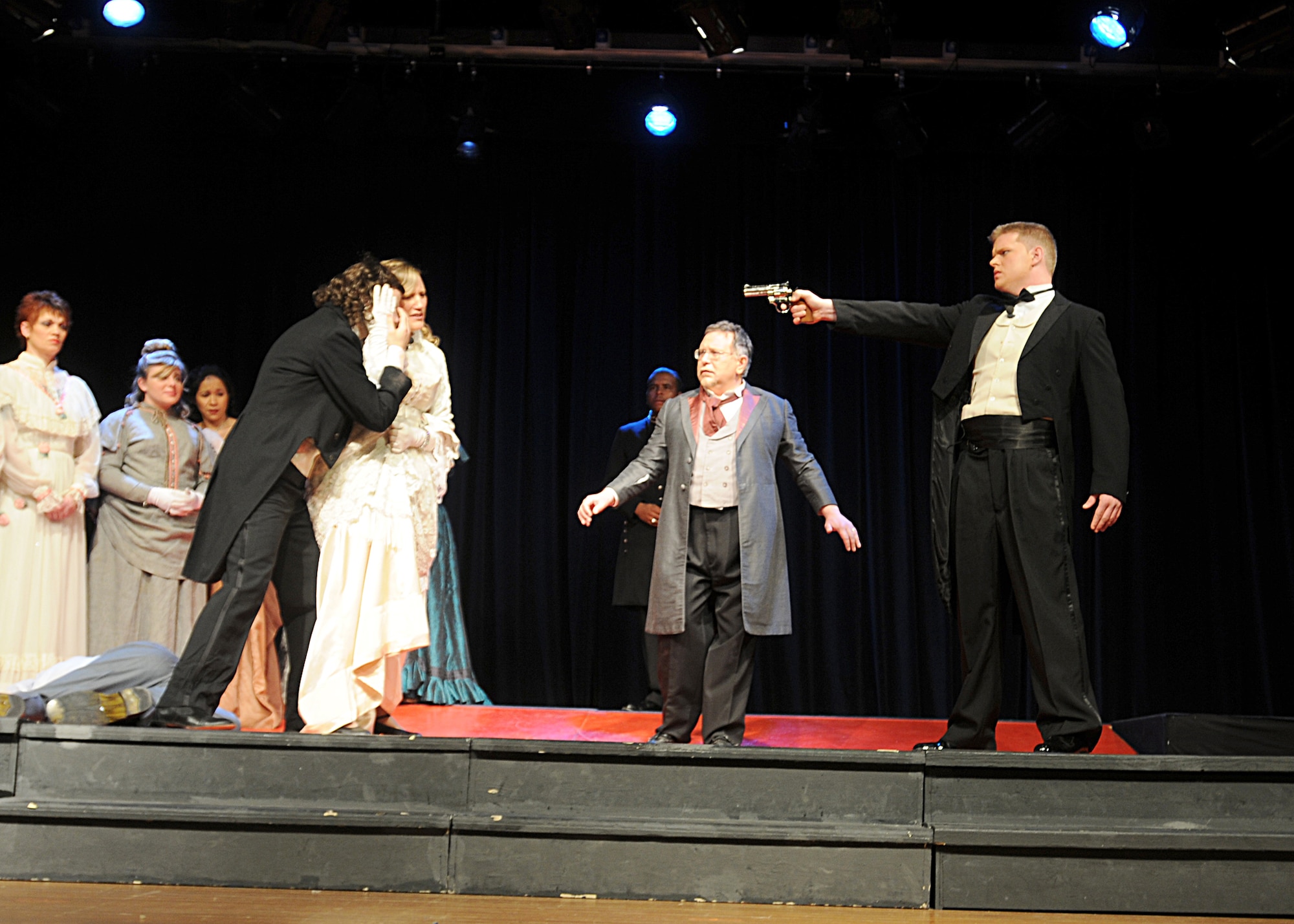 Members of the Aviano Community Theater perform during "Jekyll and Hyde: The Musical," March 19 at the Aviano High School multipurpose room.  The theater is comprised of active-duty members, local national Italians and dependents from around the Aviano area.  The next performances will be March 25 to 27, starting at 8 p.m. Tickets are sold at the door and are $5 for E-4 and below or equivalent and $10 for anyone else.  (U.S. Air Force photo/Senior Airman Tabitha M. Mans)