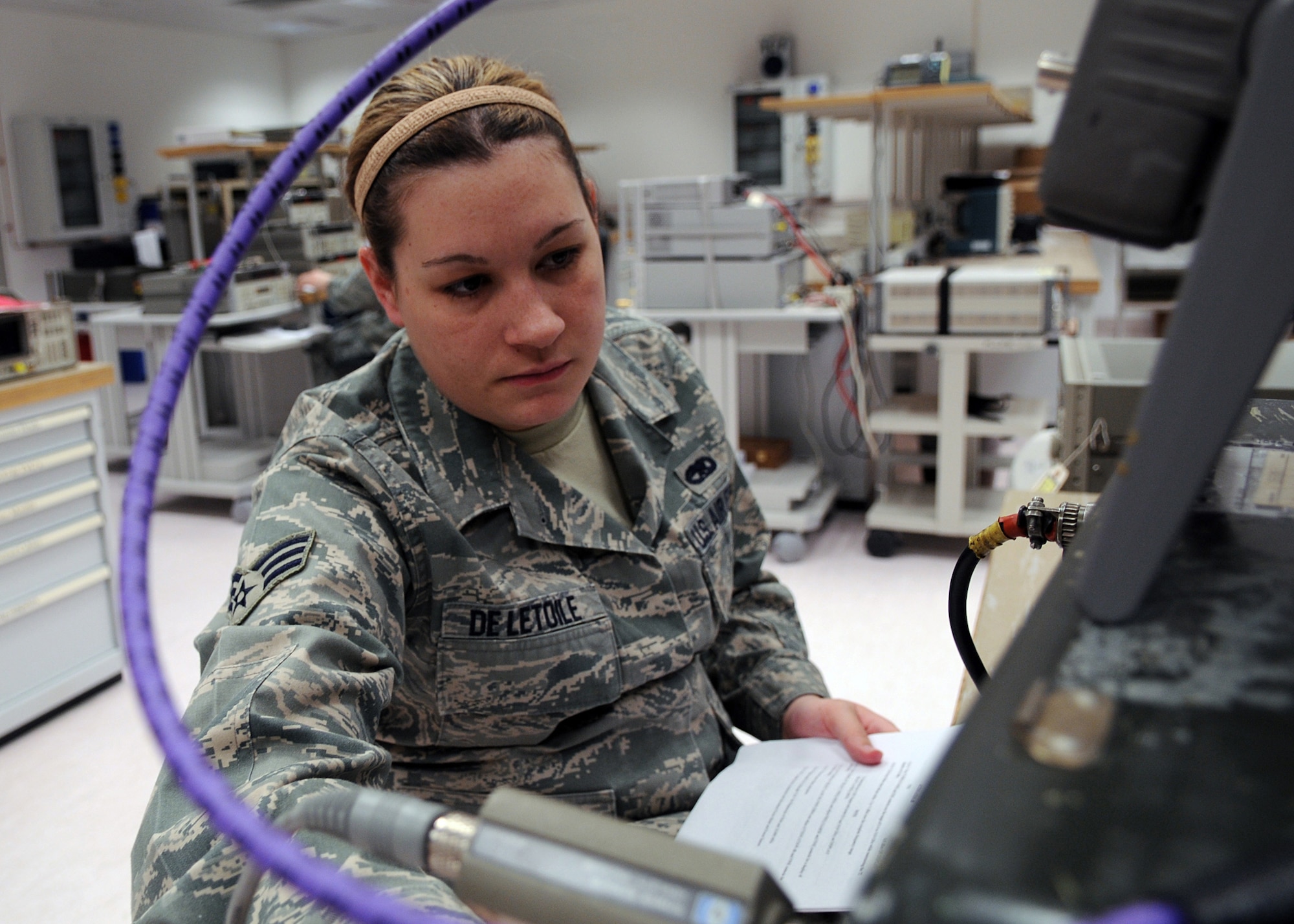 Senior Airman Monique Deletoile, 31st Maintenance Squadron, a test, measurement and diagnostic equipment technician calibrates equipment in the Precision Measurement Equipment Laboratory. The lab is broken down into three smaller labs, which include the high precision voltage lab, resistance lab, and current and capacitance lab.  (U.S. Air Force photo/Senior Airman Taylor L. Marr)    
